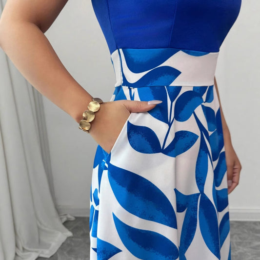Vestido de mujer con cuello en V estampado, versatil, con un azul enterizo en la parte superior,  blanco y azul en la parte inferior 



